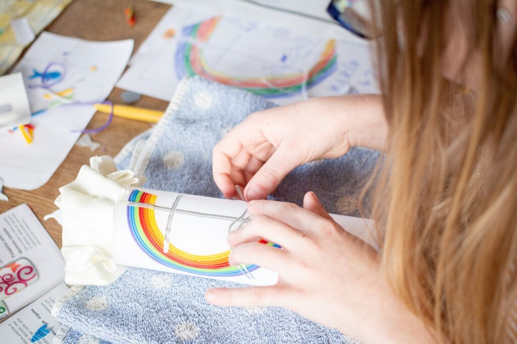 Photo of a girl making a candle at home
